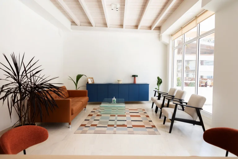 Bright YOLO Charters reception lounge in Preveza with seating and plants