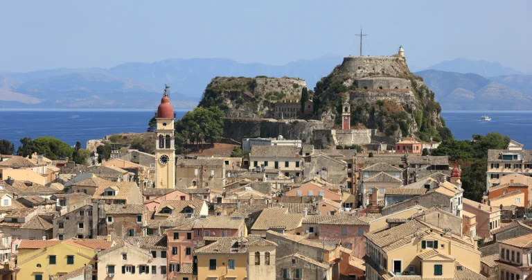 Corfu’s tiled rooftops, church tower and Old Fortress with the sea behind